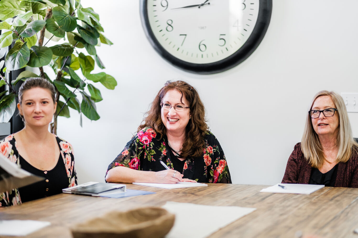 Management team meeting at a table